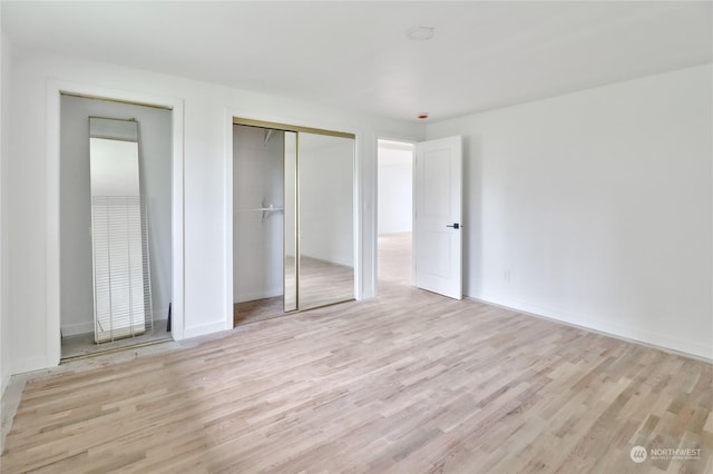 unfurnished bedroom featuring light hardwood / wood-style floors