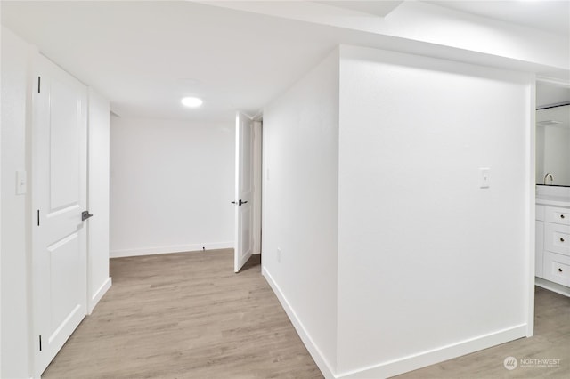 hall featuring light wood-type flooring