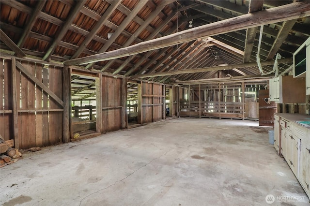 misc room featuring lofted ceiling