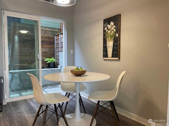 dining room featuring dark hardwood / wood-style flooring