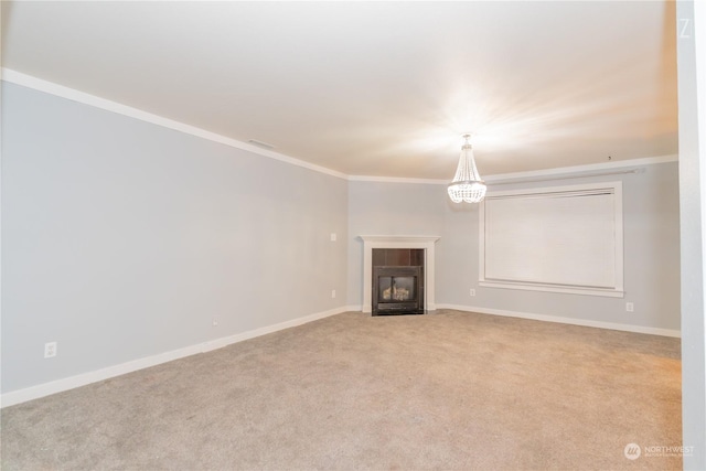 unfurnished living room featuring a chandelier, crown molding, and light carpet