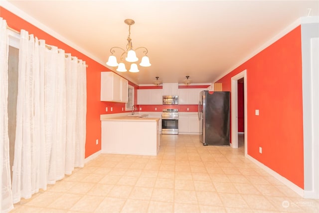 kitchen with white cabinetry, sink, stainless steel appliances, a chandelier, and pendant lighting