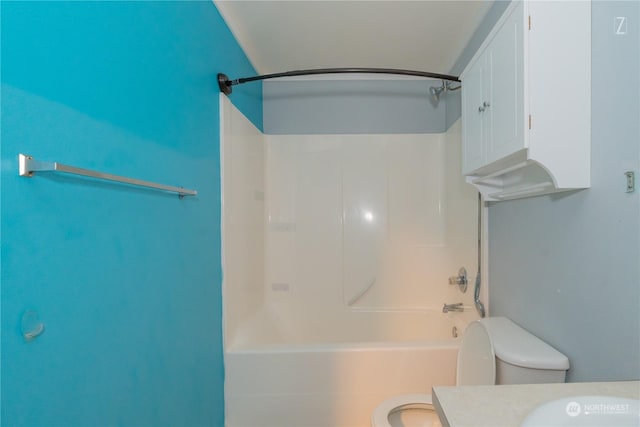 full bathroom featuring vanity, toilet, and shower / washtub combination