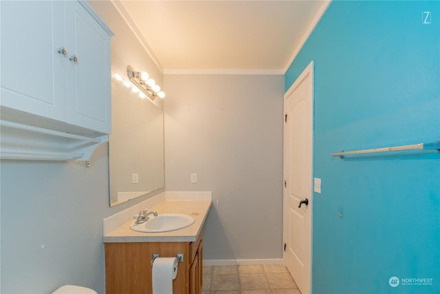 bathroom featuring vanity and ornamental molding