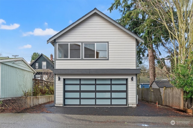 view of front of property with a garage