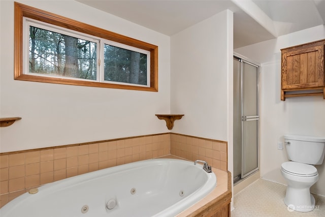 bathroom featuring tile patterned flooring, toilet, and plus walk in shower