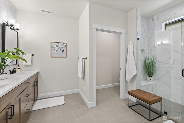 71 Plateau Loop, Cle Elum, WA 98922 - bathroom featuring double vanity, a marble finish shower, and tile patterned floors