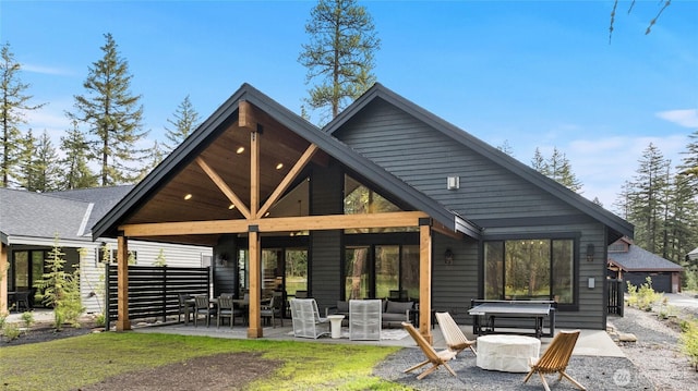 71 Plateau Loop, Cle Elum, WA 98922 - back of property with a patio and an outdoor living space