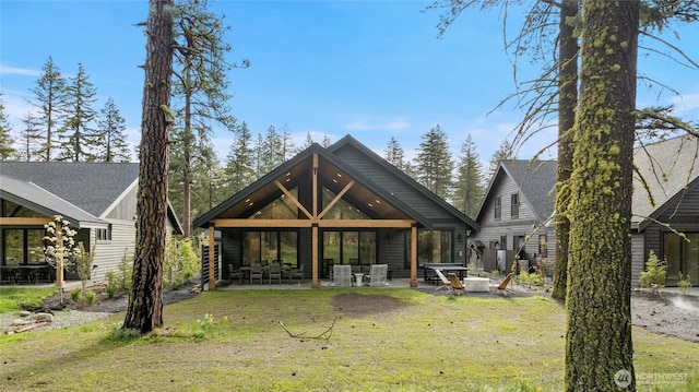 71 Plateau Loop, Cle Elum, WA 98922 - rear view of property featuring a patio and a lawn