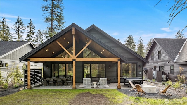 71 Plateau Loop, Cle Elum, WA 98922 - back of house with a patio area and an outdoor hangout area