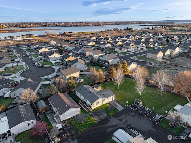 drone / aerial view featuring a water view