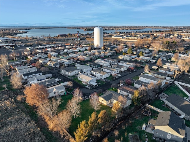 bird's eye view with a water view