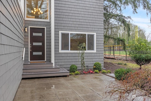 doorway to property featuring a patio area