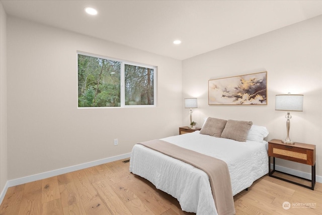 bedroom featuring light hardwood / wood-style flooring