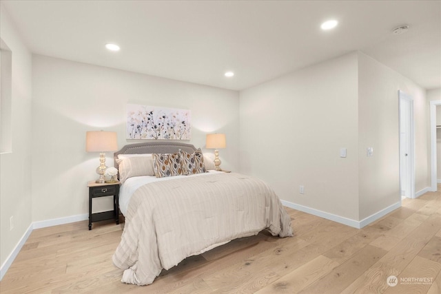 bedroom with light hardwood / wood-style floors