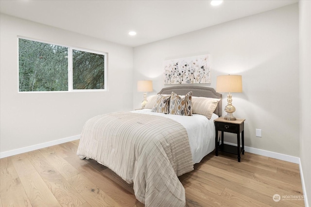 bedroom featuring light wood-type flooring