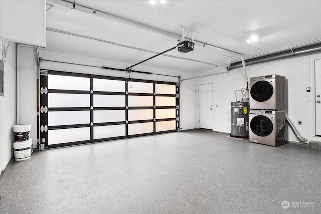 garage with a garage door opener, stacked washer / drying machine, and water heater