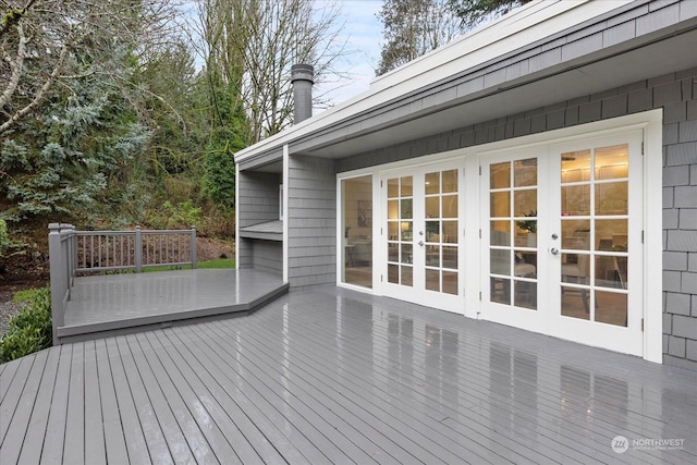 wooden deck featuring french doors