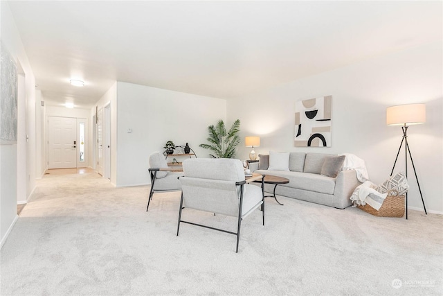 living room with light colored carpet