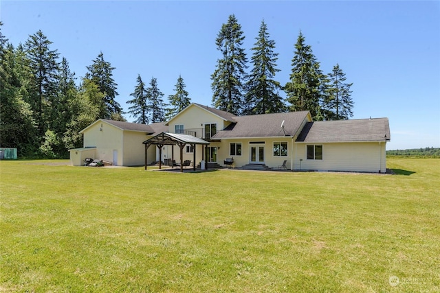 back of house featuring a gazebo, a yard, a patio, and french doors