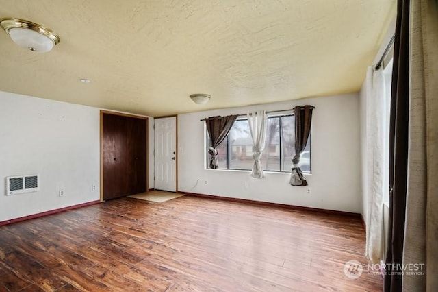 319 4th Ave, Mabton, WA 98935 - unfurnished bedroom with hardwood / wood-style floors