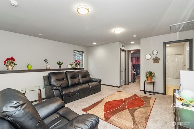 living room featuring light colored carpet