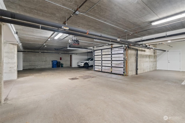 garage featuring a garage door opener