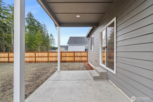 view of patio with fence