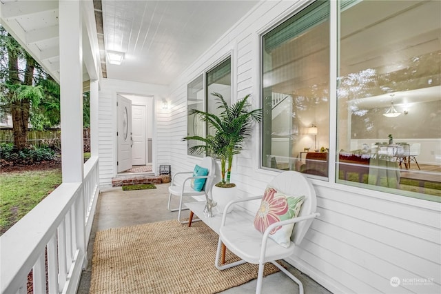 view of patio featuring a porch