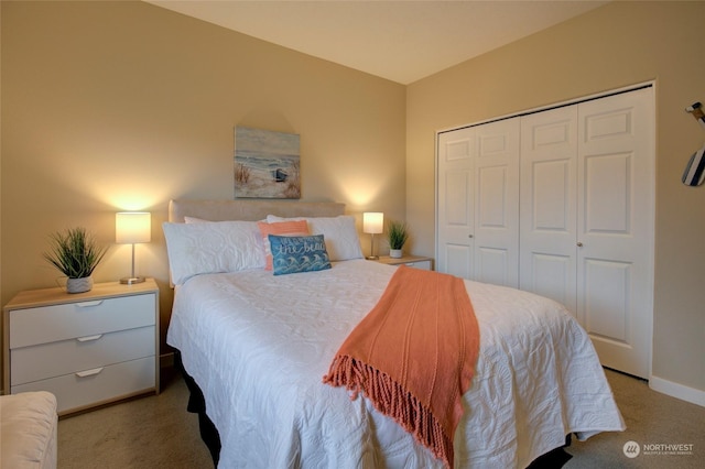 bedroom with light carpet and a closet