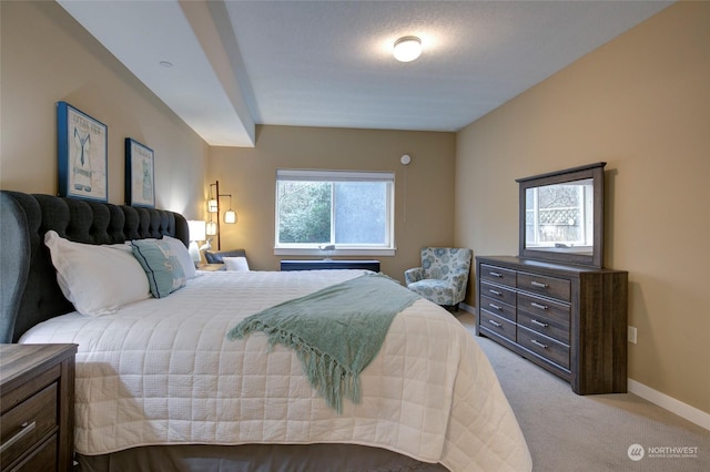 carpeted bedroom with multiple windows