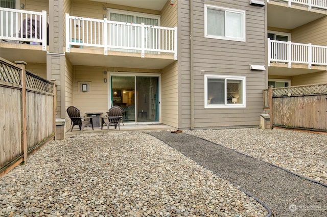 rear view of house featuring a patio