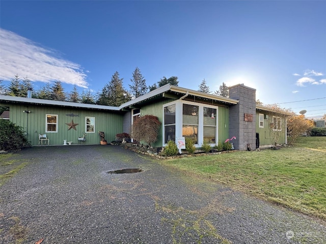 view of front of home with a front yard