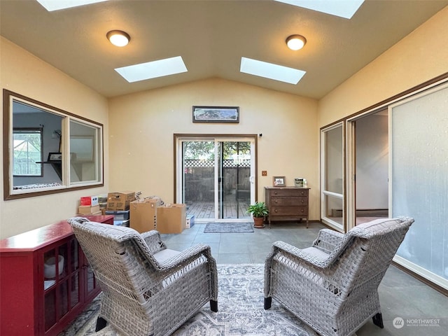 interior space featuring tile patterned flooring and lofted ceiling