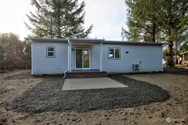 rear view of house featuring a patio