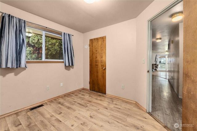 empty room featuring light wood-type flooring