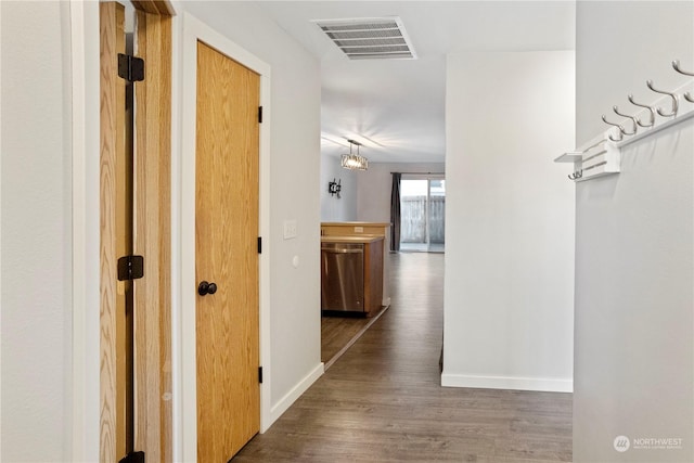 hallway featuring dark hardwood / wood-style floors