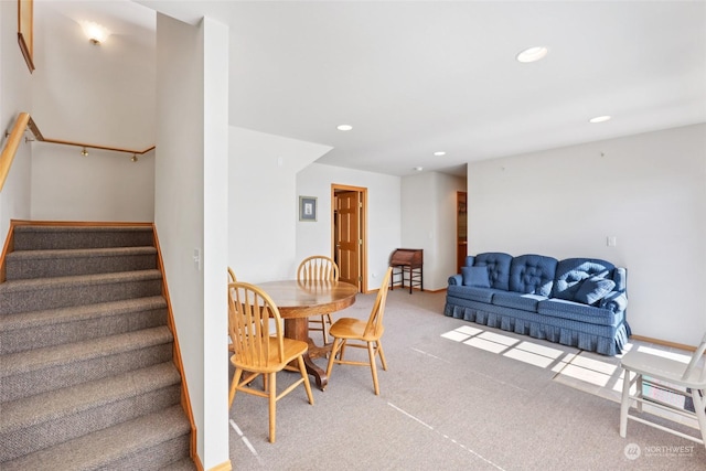 view of carpeted dining area