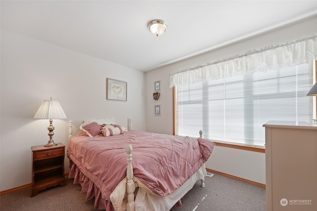 bedroom featuring light carpet