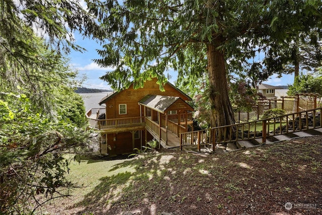 rear view of house with a deck