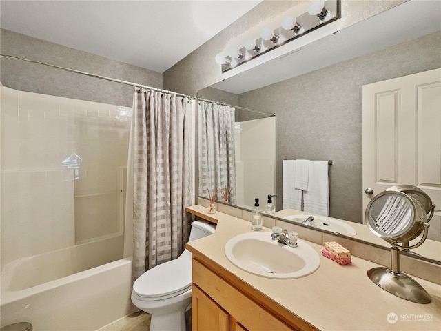 full bathroom with toilet, vanity, and shower / tub combo with curtain