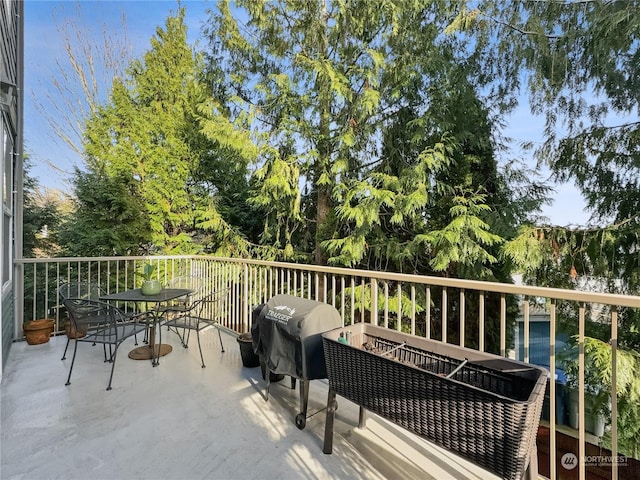 balcony featuring area for grilling