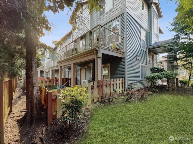 view of property exterior featuring a yard