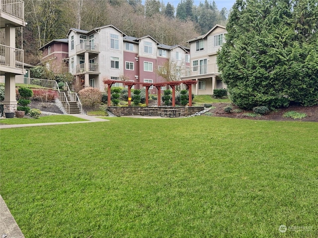 view of yard with a pergola