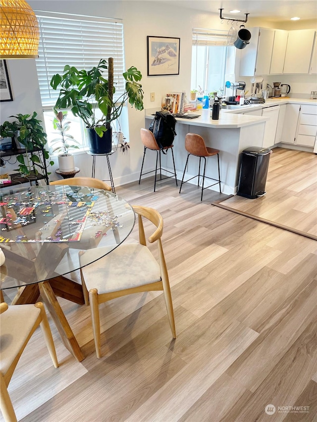 4105 Stone Way N, Seattle, WA 98103 - dining area with light hardwood / wood-style floors
