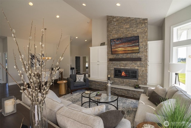 43 Triopha Ln, Sequim, WA 98382 - living area featuring baseboards, recessed lighting, high vaulted ceiling, wood finished floors, and a fireplace