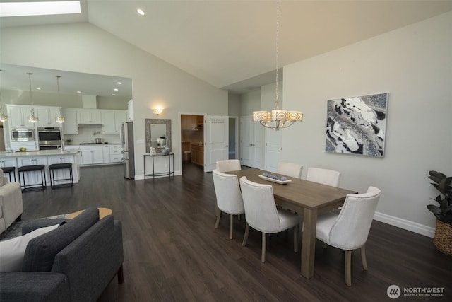43 Triopha Ln, Sequim, WA 98382 - dining room featuring high vaulted ceiling, an inviting chandelier, baseboards, dark wood-type flooring, and recessed lighting