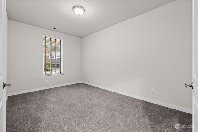 view of carpeted spare room