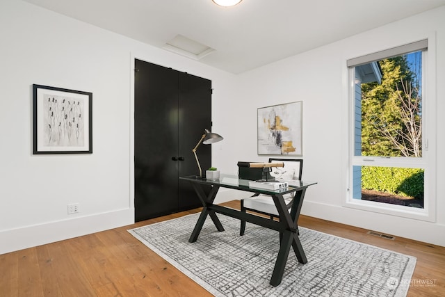 office space featuring hardwood / wood-style flooring