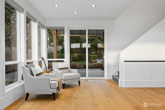 living area with light hardwood / wood-style flooring